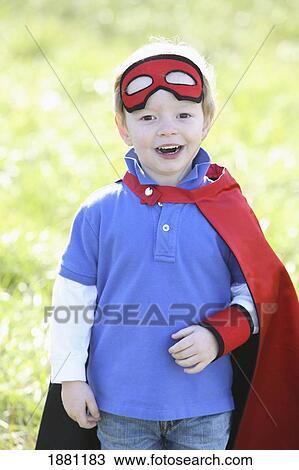 young boy playing outdoors with a mask and cape; portland, oregon, united states of america View Large Photo Image Stock Image - young boy playing outdoors with a mask and cape; portland, oregon, united states of america. Fotosearch