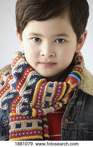 Stock Photo - young boy wearing a scarf. Fotosearch