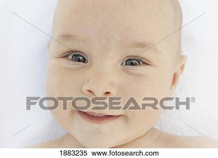 A Baby With Blue Eyes View Large Photo Image Stock Photography - A Baby With Blue Eyes. Fotosearch