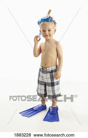 A Boy Wearing Snorkeling Gear View Large Photo Image Stock Photo - A Boy Wearing Snorkeling Gear. Fotosearch