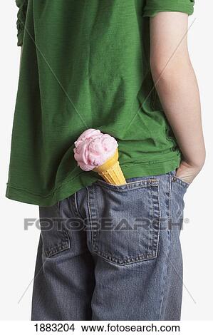 A Boy With An Ice Cream Cone In His Back Pocket View Large Photo Image Picture - A Boy With An Ice Cream Cone In His Back Pocket. Fotosearch