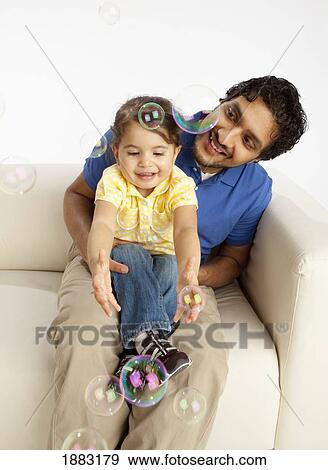 A Father With His Young Daughter View Large Photo Image Stock Photo - A Father With His Young Daughter. Fotosearch