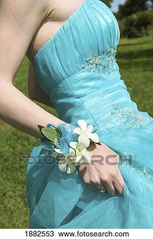 Stock Image - A Formal Strapless Blue Dress; Camrose, Alberta, Canada. Fotosearch
