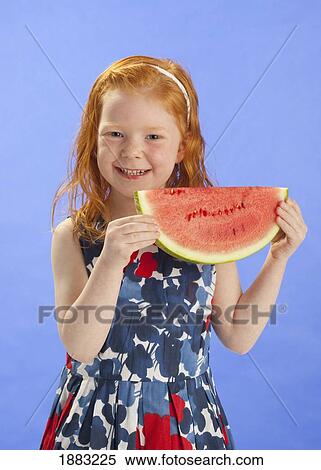 A Girl Holding A Large Slice Of A Watermelon View Large Photo Image Stock Photography - A Girl Holding A Large Slice Of A Watermelon. Fotosearch