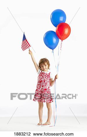 Stock Image - A Girl Holding Red And Blue Balloons And An American Flag. Fotosearch