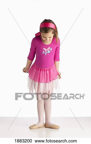 A Girl Wearing Ballet Shoes In A Ballet Pose View Large Photo Image Stock Image - A Girl Wearing Ballet Shoes In A Ballet Pose. Fotosearch