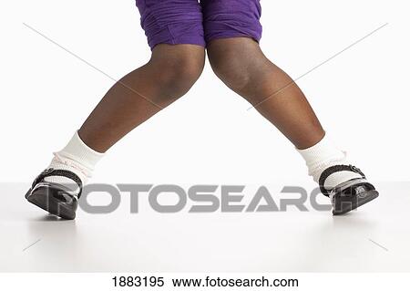 A Girl Wearing Black Patent Shoes View Large Photo Image Stock Photography - A Girl Wearing Black Patent Shoes. Fotosearch