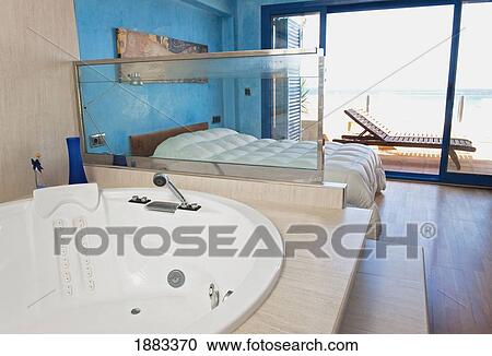 A Hotel Room Off Los Lances Beach With A Large Soaker Tub; Tarifa, Cadiz, Andalusia, Spain View Large Photo Image Stock Image - A Hotel Room Off Los Lances Beach With A Large Soaker Tub; Tarifa, Cadiz, Andalusia, Spain. Fotosearch