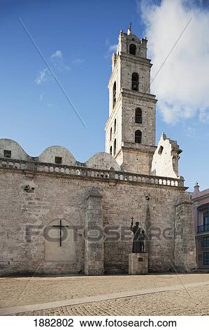 A Monument Of Fray Junipero Serra With Juaneño, An Indian Boy, At The Front Of The 16Th Century Basilica Menor De San Francisco De Asis In Plaza De San Francisco; Havana, Cuba View Large Photo Image Stock Image - A Monument Of Fray Junipero Serra With Juaneño, An Indian Boy, At The Front Of The 16Th Century Basilica Menor De San Francisco De Asis In Plaza De San Francisco; Havana, Cuba. Fotosearch