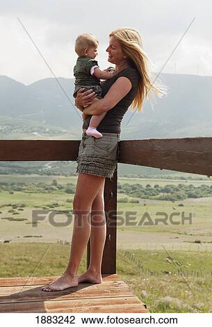 A Mother With Her Baby Daughter; Tarifa, Cadiz, Andalusia, Spain View Large Photo Image Stock Image - A Mother With Her Baby Daughter; Tarifa, Cadiz, Andalusia, Spain. Fotosearch
