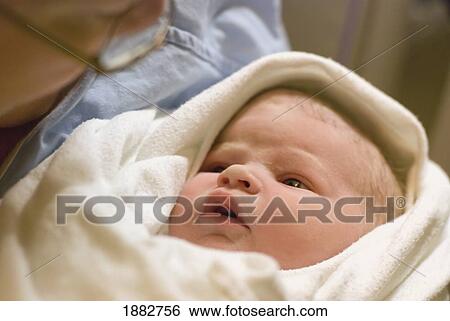 Stock Photograph - A Newborn Baby; Millet, Alberta, Canada. Fotosearch