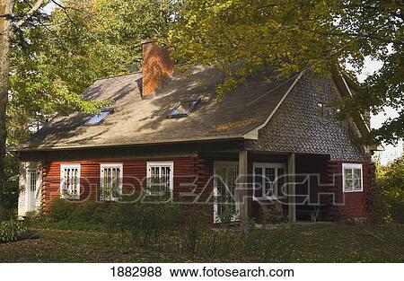 A Red Log Home; Iron Hill, Quebec, Canada View Large Photo Image Stock Photo - A Red Log Home; Iron Hill, Quebec, Canada. Fotosearch