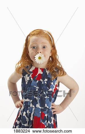 A Young Girl With A Daisy In Her Mouth View Large Photo Image Picture - A Young Girl With A Daisy In Her Mouth. Fotosearch