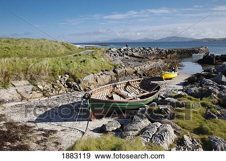 Boats On The Shore Of Eilogarry Beach; Isle Of Barra, Scotland View Large Photo Image Stock Photo - Boats On The Shore Of Eilogarry Beach; Isle Of Barra, Scotland. Fotosearch