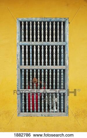 Cuban House Facade With Hands Holding The Bars In The Window; Trinidad, Cuba View Large Photo Image Stock Photograph - Cuban House Facade With Hands Holding The Bars In The Window; Trinidad, Cuba. Fotosearch