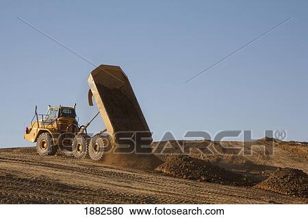 Dump Truck Hauling Earth; Edmonton, Alberta, Canada View Large Photo Image Stock Image - Dump Truck Hauling Earth; Edmonton, Alberta, Canada. Fotosearch
