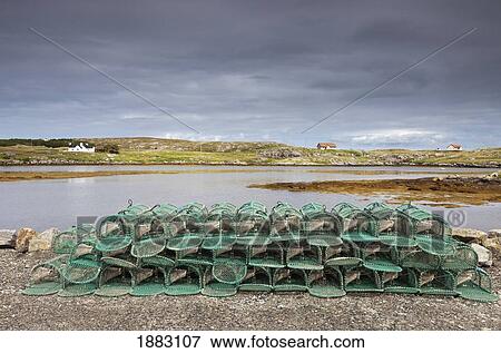 Fishing Traps Sitting On The Shore; Isle Of Barra, Scotland View Large Photo Image Stock Photo - Fishing Traps Sitting On The Shore; Isle Of Barra, Scotland. Fotosearch
