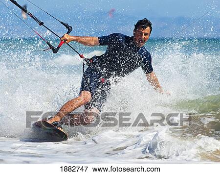 Kite Surfing In Front Of Hotel Dos Mares; Tarifa, Cadiz, Andalusia, Spain View Large Photo Image Stock Photo - Kite Surfing In Front Of Hotel Dos Mares; Tarifa, Cadiz, Andalusia, Spain. Fotosearch
