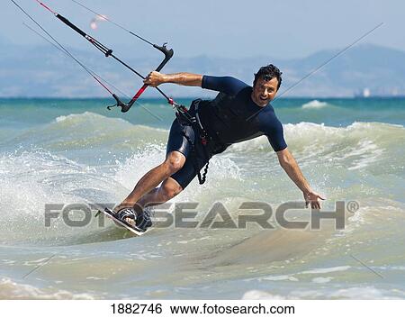Kite Surfing In Front Of Hotel Dos Mares; Tarifa, Cadiz, Andalusia, Spain View Large Photo Image Stock Photograph - Kite Surfing In Front Of Hotel Dos Mares; Tarifa, Cadiz, Andalusia, Spain. Fotosearch