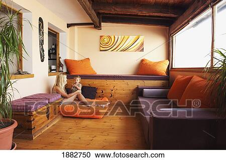 Stock Image - Mother With Young Son In Their Home; Tarifa, Cadiz, Andalusia, Spain. Fotosearch
