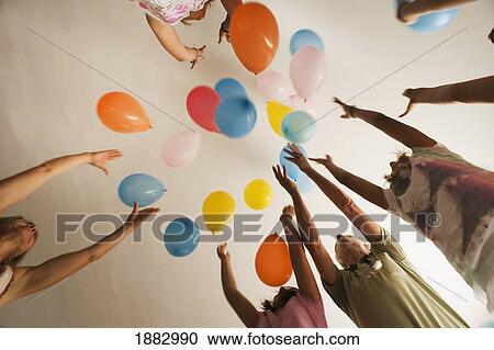People Reaching For Balloons In The Air View Large Photo Image Stock Image - People Reaching For Balloons In The Air. Fotosearch
