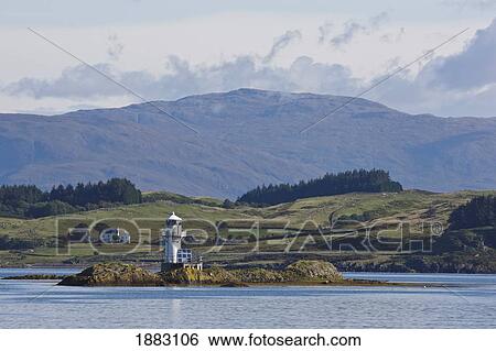 Stock Photograph - Rhue Lighthouse; Summer Isles, Scotland. Fotosearch