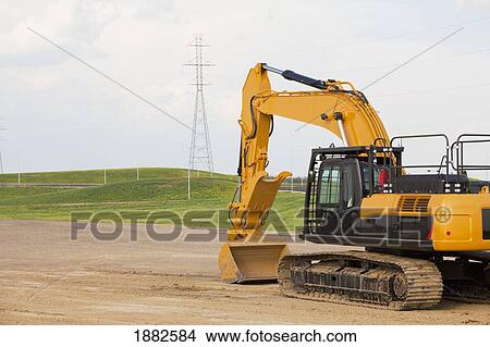 Road Construction Using A Backhoe; Edmonton, Alberta, Canada View Large Photo Image Picture - Road Construction Using A Backhoe; Edmonton, Alberta, Canada. Fotosearch