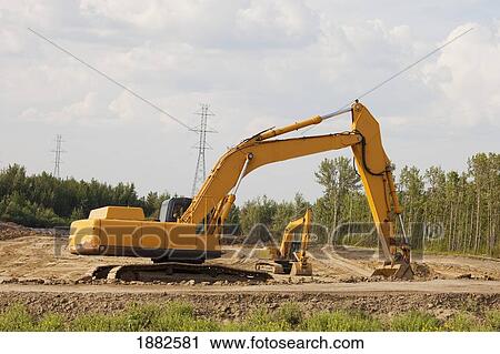 Road Construction Using A Backhoe; Edmonton, Alberta, Canada View Large Photo Image Stock Image - Road Construction Using A Backhoe; Edmonton, Alberta, Canada. Fotosearch