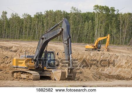 Road Construction Using A Backhoe; Edmonton, Alberta, Canada View Large Photo Image Stock Image - Road Construction Using A Backhoe; Edmonton, Alberta, Canada. Fotosearch