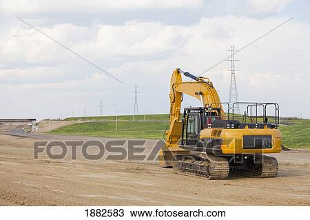 Road Construction Using A Backhoe; Edmonton, Alberta, Canada View Large Photo Image Stock Image - Road Construction Using A Backhoe; Edmonton, Alberta, Canada. Fotosearch