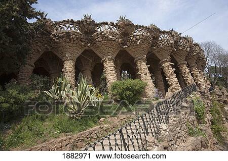 Stock Image - Supporting Columns With Seating Above In Park Güell; Barcelona, Spain. Fotosearch