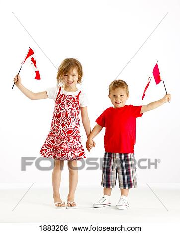 Stock Photo - Two Children Holding Canadian Flags. Fotosearch