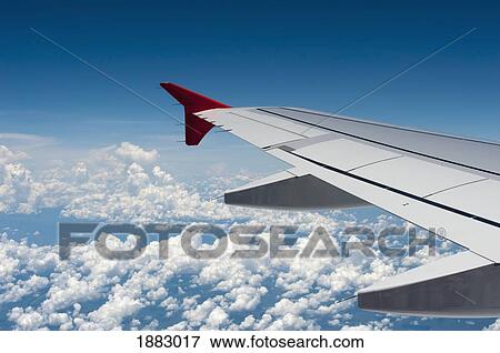 View From A Plane Seat Out The Window Somewhere Over The Andaman Sea View Large Photo Image Stock Photo - View From A Plane Seat Out The Window Somewhere Over The Andaman Sea. Fotosearch