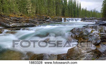 Stock Photo - Waterfall In Sheep River In The Canadian Rocky Mountains; Kananaskis, Alberta, Canada. Fotosearch