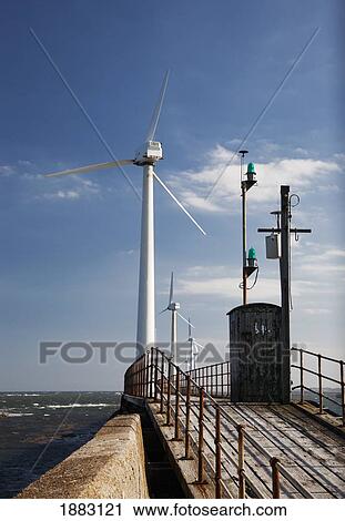 Wind Turbine On A Pier Along The Coast; Blyth, Northumberland, England View Large Photo Image Stock Image - Wind Turbine On A Pier Along The Coast; Blyth, Northumberland, England. Fotosearch