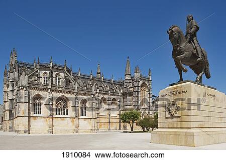 14th century monastery of santa maria of victoria, better known as batalha (battle abbey) with monument to nvno alvares pereira in the foreground; batalha, estremadura and ribatejo, portugal View Large Photo Image Picture - 14th century monastery of santa maria of victoria, better known as batalha (battle abbey) with monument to nvno alvares pereira in the foreground; batalha, estremadura and ribatejo, portugal. Fotosearch
