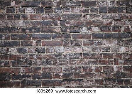 Stock Photo - a brick wall; manhattan, new york city, new york, united states of america. Fotosearch