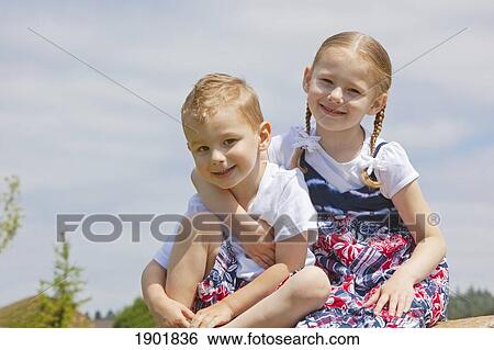 Stock Photograph - a brother and sister; portland, oregon, united states of america. Fotosearch