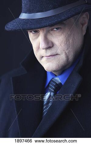 a businessman wearing a top hat and coat; portland, oregon, united states of america View Large Photo Image Stock Photograph - a businessman wearing a top hat and coat; portland, oregon, united states of america. Fotosearch