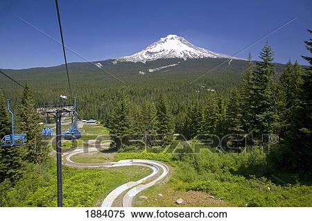 a chair lift at a ski resort and mount hood in the oregon cascades; oregon, united states of america View Large Photo Image Stock Photography - a chair lift at a ski resort and mount hood in the oregon cascades; oregon, united states of america. Fotosearch