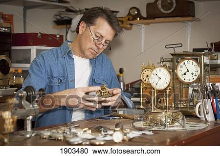 a clock maker and repairman; st. catharines, ontario, canada View Large Photo Image Stock Image - a clock maker and repairman; st. catharines, ontario, canada. Fotosearch