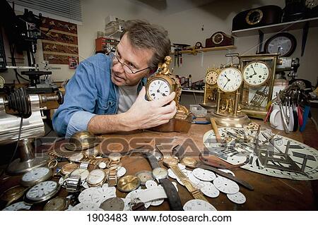 a clock maker and repairman; st. catharines, ontario, canada View Large Photo Image Stock Image - a clock maker and repairman; st. catharines, ontario, canada. Fotosearch