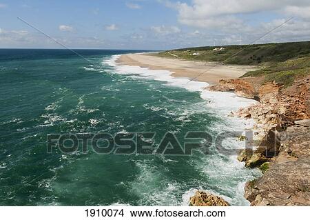 Picture - a deserted beach; nazare, estremadura and ribatejo, portugal. Fotosearch