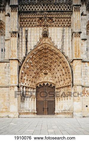 Stock Photograph - a door at the 14th century monastery of santa maria of victoria, better known as batalha (battle abbey); batalha, estremadura and ribatejo, portugal. Fotosearch