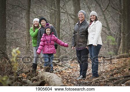 a family portrait in a snowfall; grimsby, ontario, canada View Large Photo Image Picture - a family portrait in a snowfall; grimsby, ontario, canada. Fotosearch
