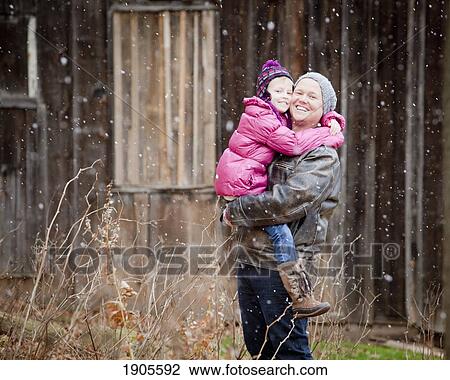a father and daughter in a snowfall; grimsby, ontario, canada View Large Photo Image Stock Image - a father and daughter in a snowfall; grimsby, ontario, canada. Fotosearch