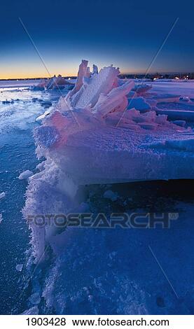 a frozen lake with chunks of ice pushed up; edmonton, alberta, canada View Large Photo Image Stock Photo - a frozen lake with chunks of ice pushed up; edmonton, alberta, canada. Fotosearch