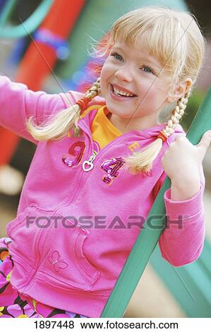 a girl at the playground; troutdale, oregon, united states of america View Large Photo Image Stock Photo - a girl at the playground; troutdale, oregon, united states of america. Fotosearch