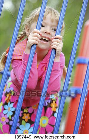 a girl at the playground; troutdale, oregon, united states of america View Large Photo Image Stock Photo - a girl at the playground; troutdale, oregon, united states of america. Fotosearch