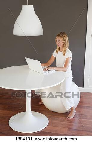 a girl wearing white using a white laptop computer in a room furnished in white; benalamadena costa, malaga, andalusia, spain View Large Photo Image Stock Image - a girl wearing white using a white laptop computer in a room furnished in white; benalamadena costa, malaga, andalusia, spain. Fotosearch